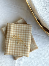 Load image into Gallery viewer, double sided beige checkered baby muslin cloth on a white background