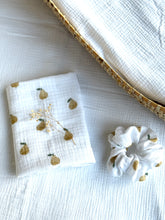 Load image into Gallery viewer, White baby muslin cloth with gold pear pattern with a matching hair scrunchie